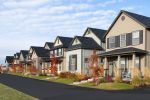Eight row houses, newly constructed with fall colors